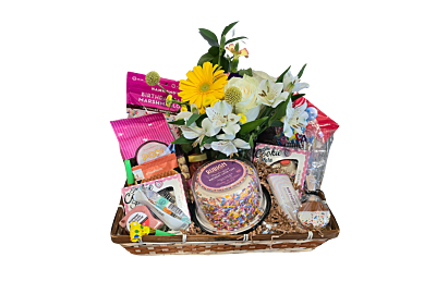 Hand-delivered birthday gift basket with flowers and treats