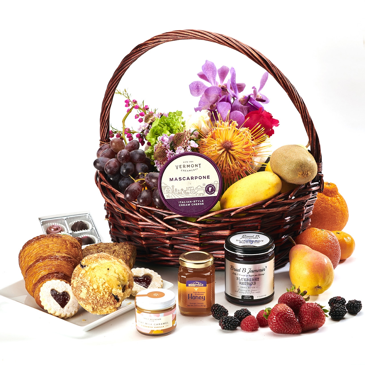 Breakfast Fruits , flowers and pastries Jam and Honey and a Market arrangement