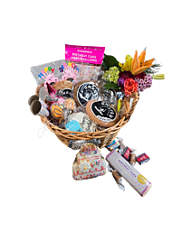 Birthday Bliss Basket with cookies, chocolates, and festive items