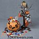 halloween pumpkin and budvase