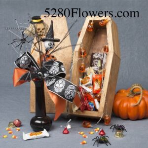 Halloween coffin of candy with a bud vase