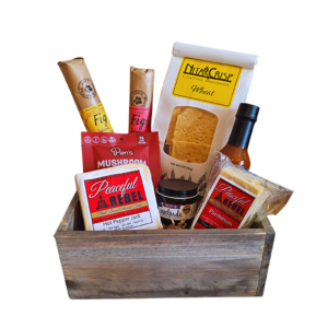 Shop our Vegan Charcuterie Crate featuring vegan cheese, plant-based salami, crackers, hot sauce, and mushroom jerky. A perfect vegan gift basket for any occasion