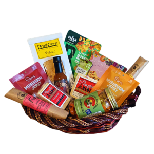 Vegan charcuterie gift basket with plant-based cheeses and vegan salami